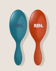 REN. Duet detangling brushes in Turquoise and Terracotta