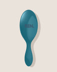 REN. Ultimate detangling brush in Turquoise